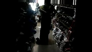 Indian shop assistant flaunts her curves and hairy treasure while she works.