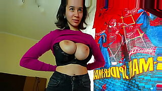 MylaAngel wears tight clothes, presses her tits hard, sucks her nipples