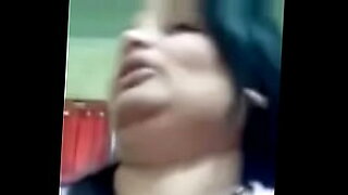 Young woman gives blow job to her BF while their friends watch.