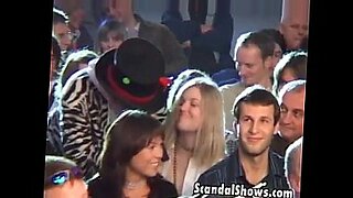 Hot brunette girl seduces the crowd