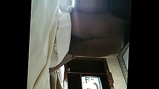 Black couple getting it in a hotel.