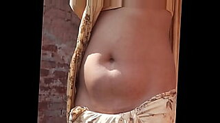 Beautiful Indian wife shows off her sexy navel.