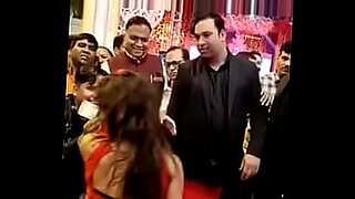 See a hot Indian woman dance in a red saree and get naughty.