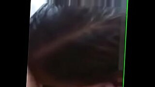 A hot Punjabi bhabi enjoys sucking on a big black cock and swallowing it.