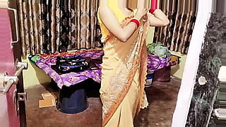 Bhabhi wore a yellow sari and took me to the bedroom.