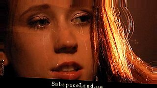 Redhead teen slave punished by her master with spanking and vibrator torture.