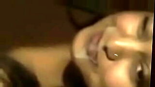 Wife gets a facial from her friend.