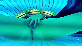 Trixie has fun in the tanning bed