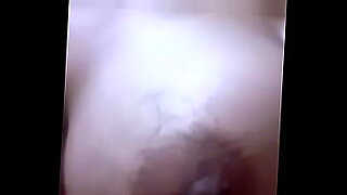Beautiful woman enjoys solo pleasure and touches her body.