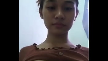 Hot youthfull khmer nymph taking selfie with nude body