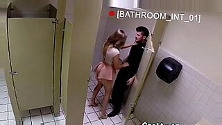 Housewife big facial in restaurant restroom.