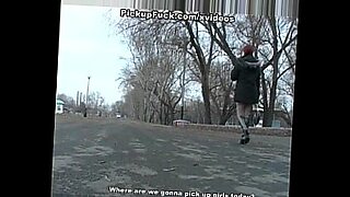 Redhead student sucks on the banks of the river for all to see