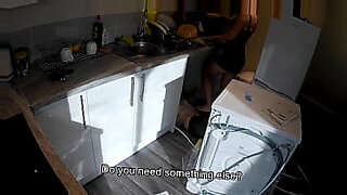 Horny wife seduces a plumber in the kitchen while her husband at work.