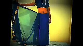 Pretty Indian girl shows her beautiful body in a saree.