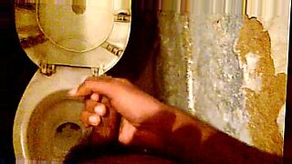 This is a hot video of an Indian man pleasuring himself in the bathroom.