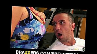 Blonde gym trainer Nikki Phoenix helps her client with his Cardio