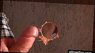 Bitch in stockings fucking dick on gloryhole