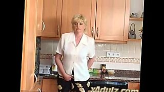 Horny Blonde Granny in the Kitchen Masturbates to Orgasm with Dildo