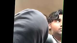 Men sucking her boobs from behind