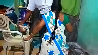 Beautiful Tamil woman gives a blowjob and gets fucked in the ass in the bathroom.