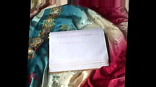 Beautiful mother in a saree seduces.