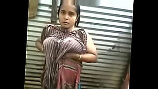 Beautiful Indian woman with large breasts getting naked and teasing.