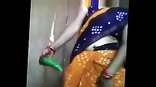 Indian bhabi masturbates and rubs her pussy while watching a video.