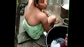 Watch an Indian Bhabhi take a bath in public in a homemade porn video.