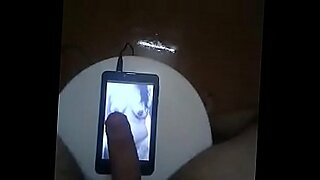 Indian housewife gets a cum tribute while watching porn.